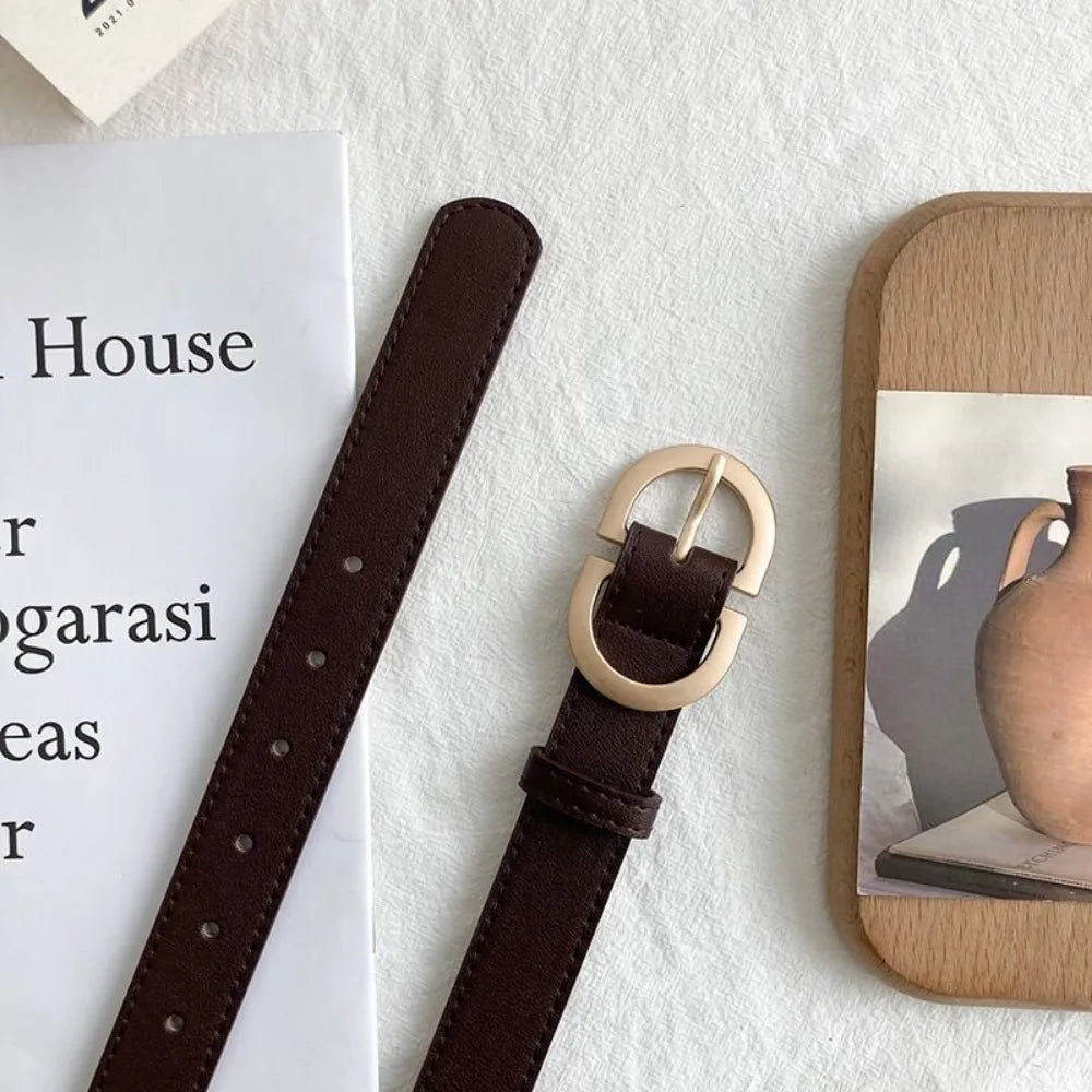 Coffey חגורת נשים קלאסית עם אבזם עגול