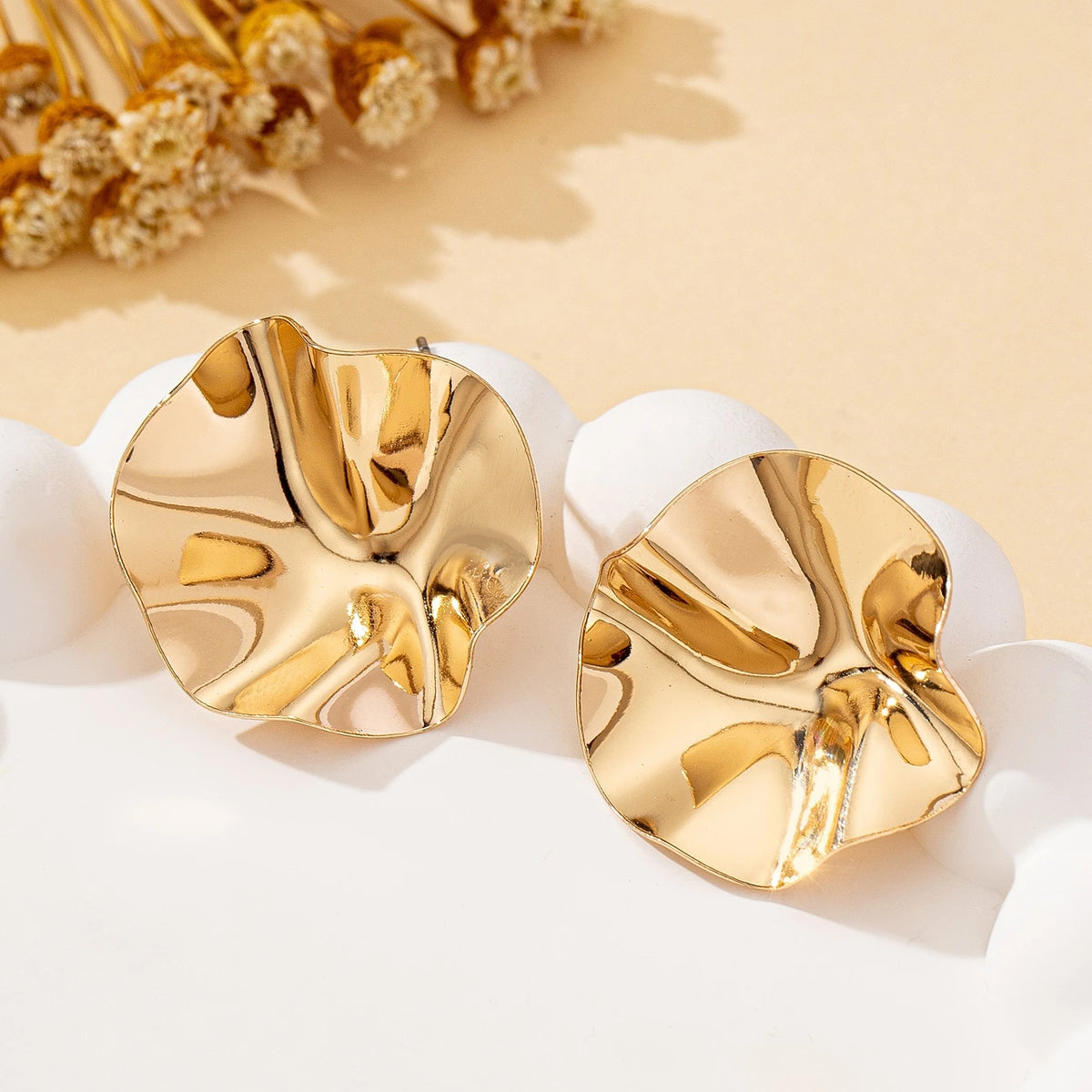 Brooks עגילי מטאל עגולים א-סימטריים