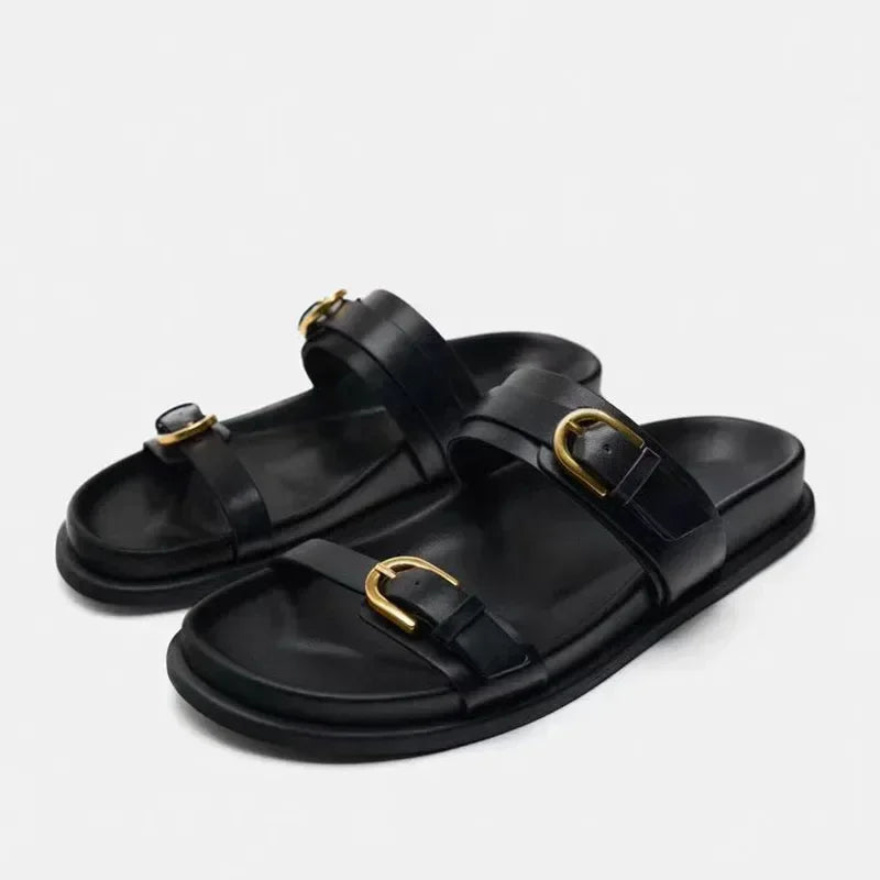 Ashley כפכפים שטוחים עם אבזמים