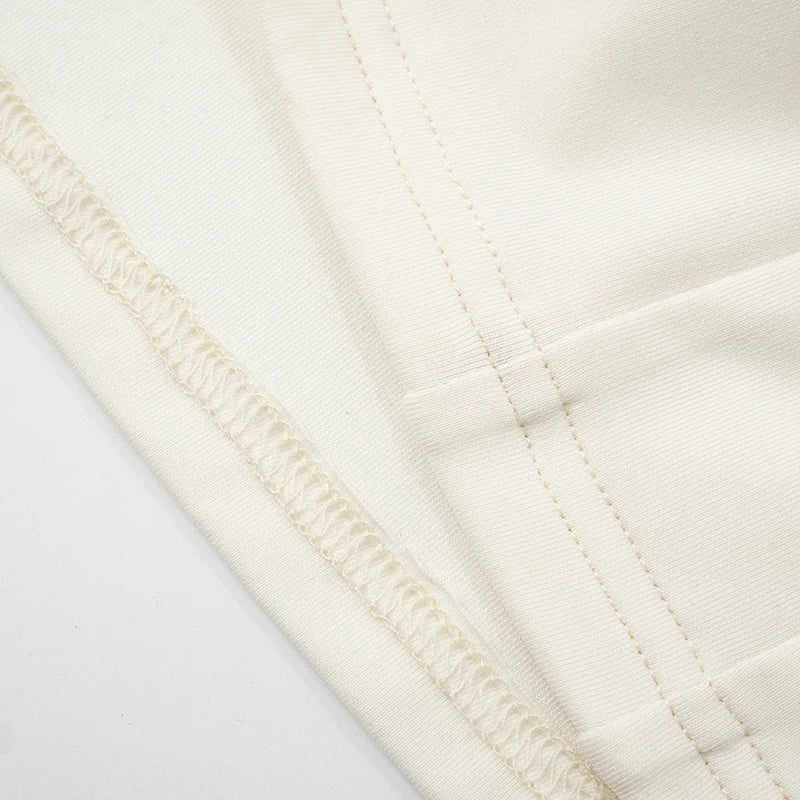 Angela טופ עם כתפיות כפולות