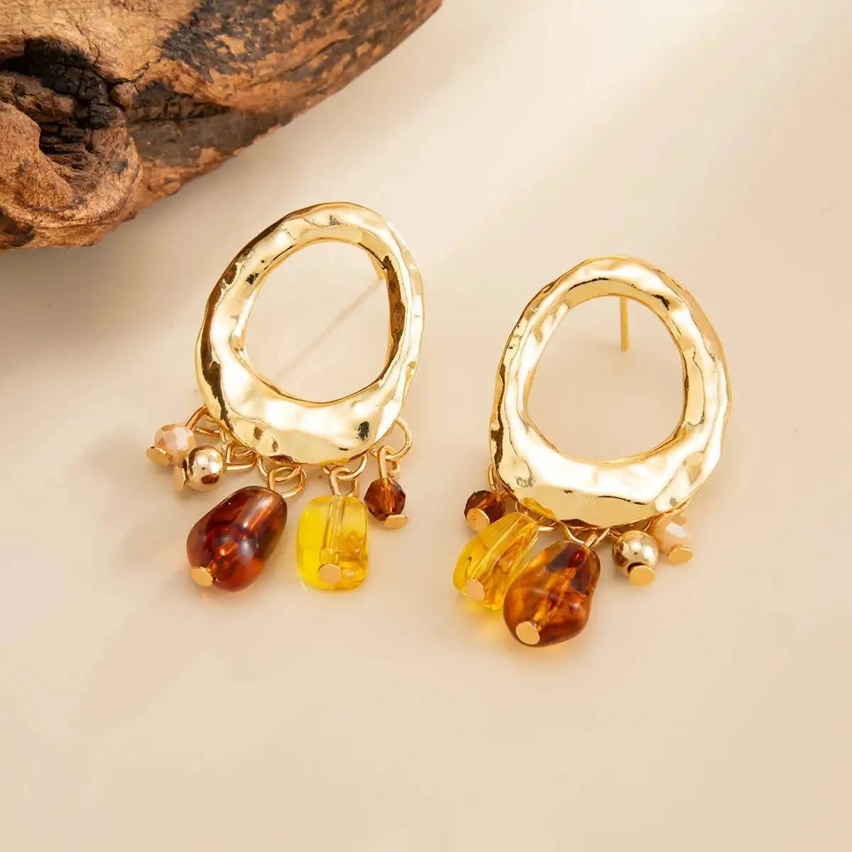 Aurelle עגילי טסל בגוון אמבר